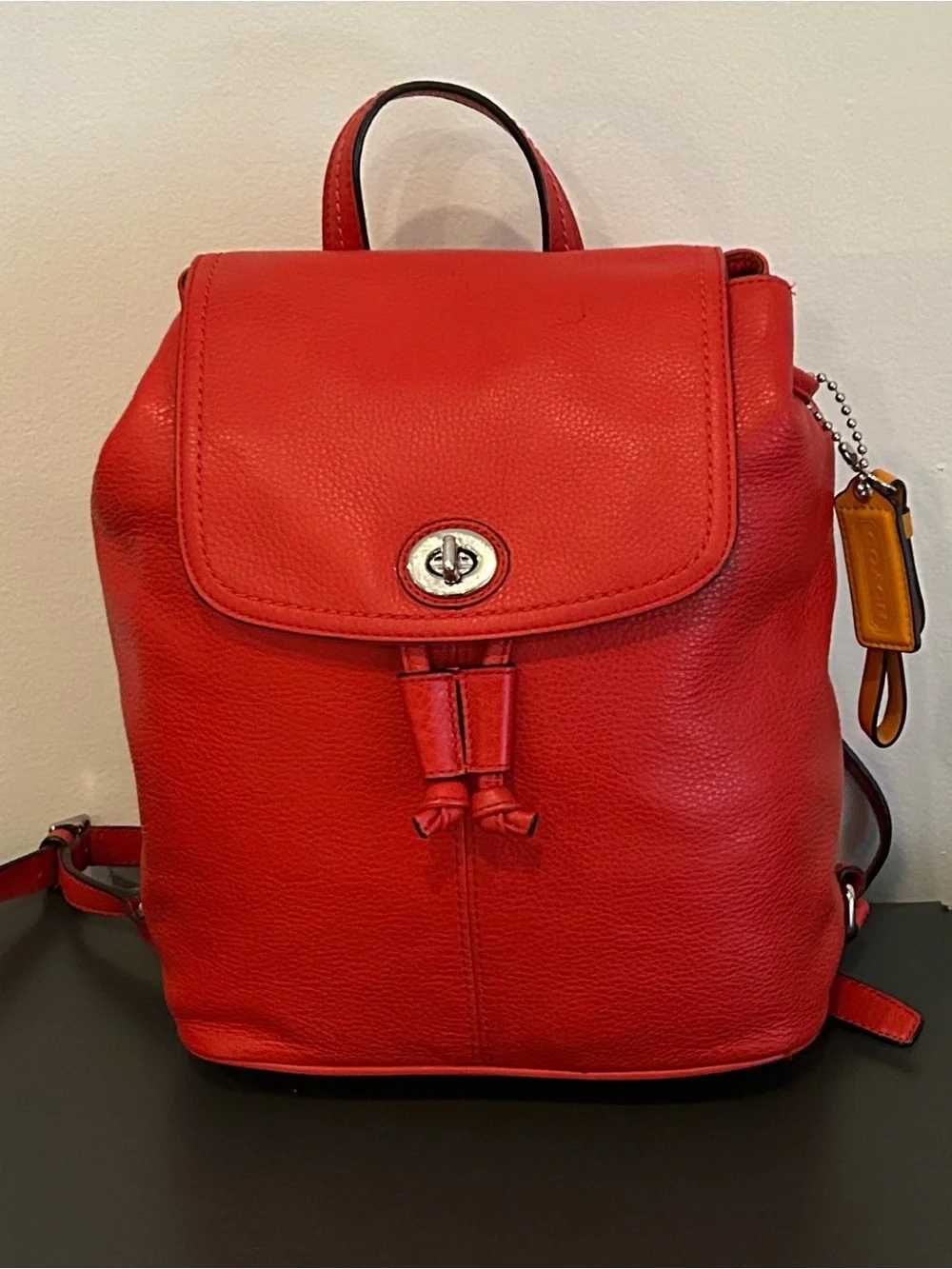 Coach Red Pebbled Leather Turnlock Drawstring Backpack Top Handle F24385